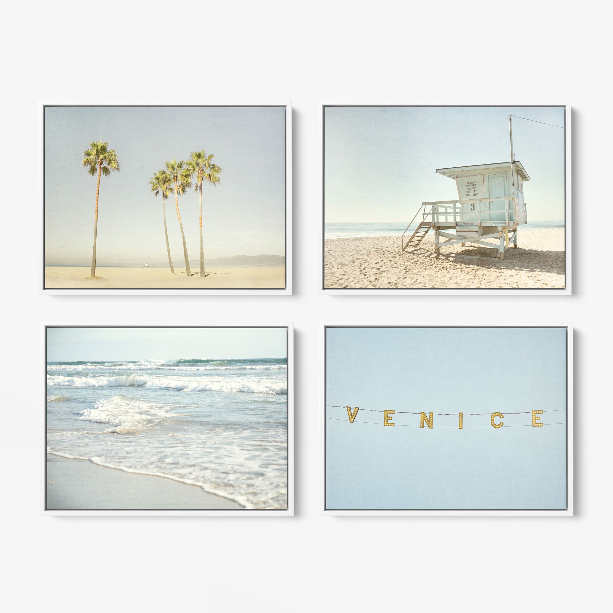 Introducing the Offley Green Set of 4 Framed Canvas prints. This collection includes a variety of designs, such as: 
- Top left: palm trees on a sandy beach capturing coastal vibes,
- Top right: a lifeguard tower standing on the shoreline,
- Bottom left: ocean waves gently approaching the shore,
- Bottom right: &quot;Venice&quot; illuminated with string lights against a clear sky.

Choose from multiple combinations to personalize your space.