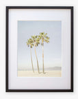 A framed photograph of the California Venice Beach Print 'Three Palms' by Offley Green, depicting three tall palm trees on Venice Beach under a clear sky, displayed against a white background.