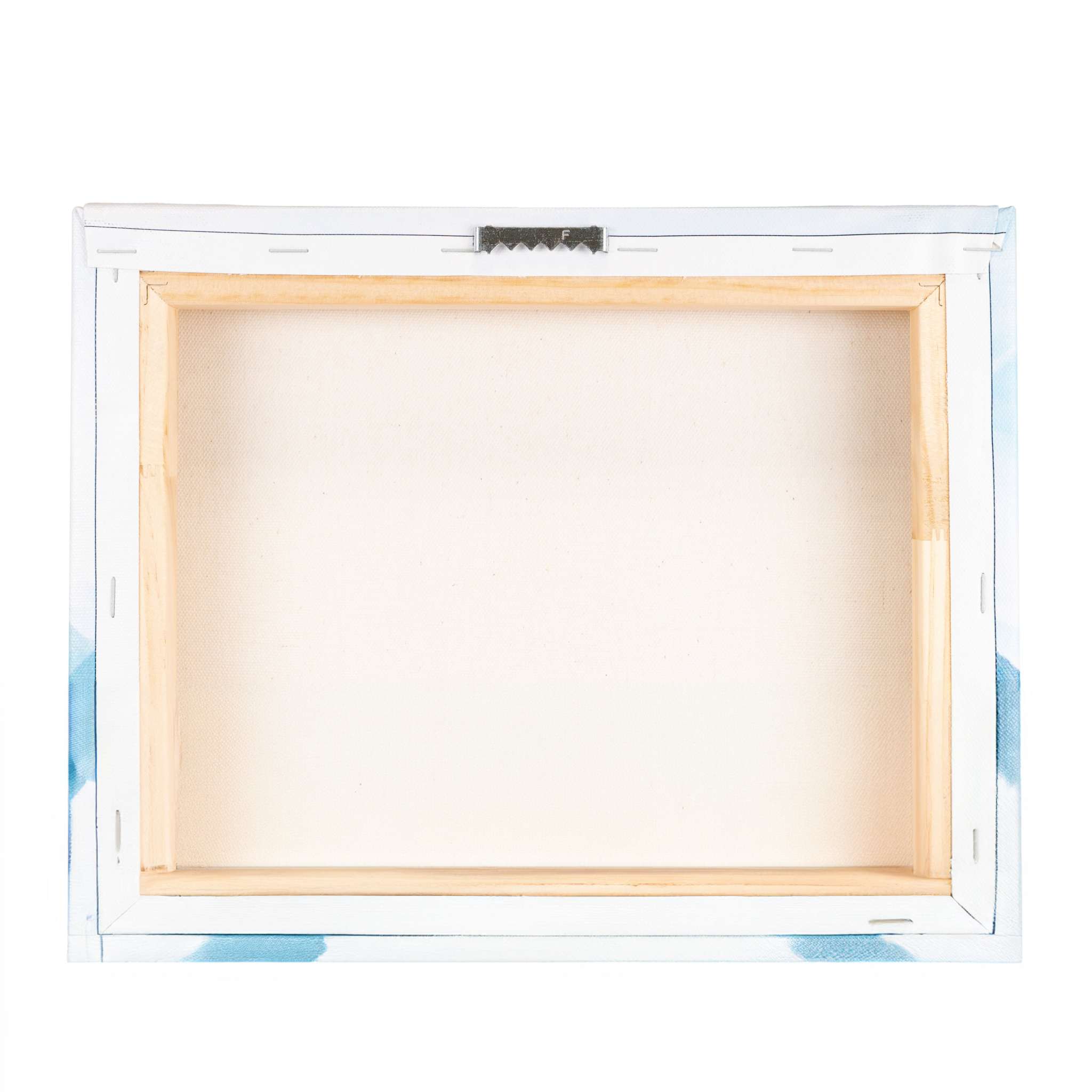 The image shows the back view of a stretched canvas frame, ideal for showcasing wall art. The wooden frame holds a blank, unprimed white canvas tightly in place. The canvas edges are secured with staples, and a metal hanging hook is attached at the top center of the frame for easy display.